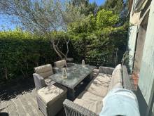 La terrasse de l'Appartement de standing avec piscine à Puyricard