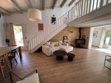 séjour avec poele volume et mezzanine